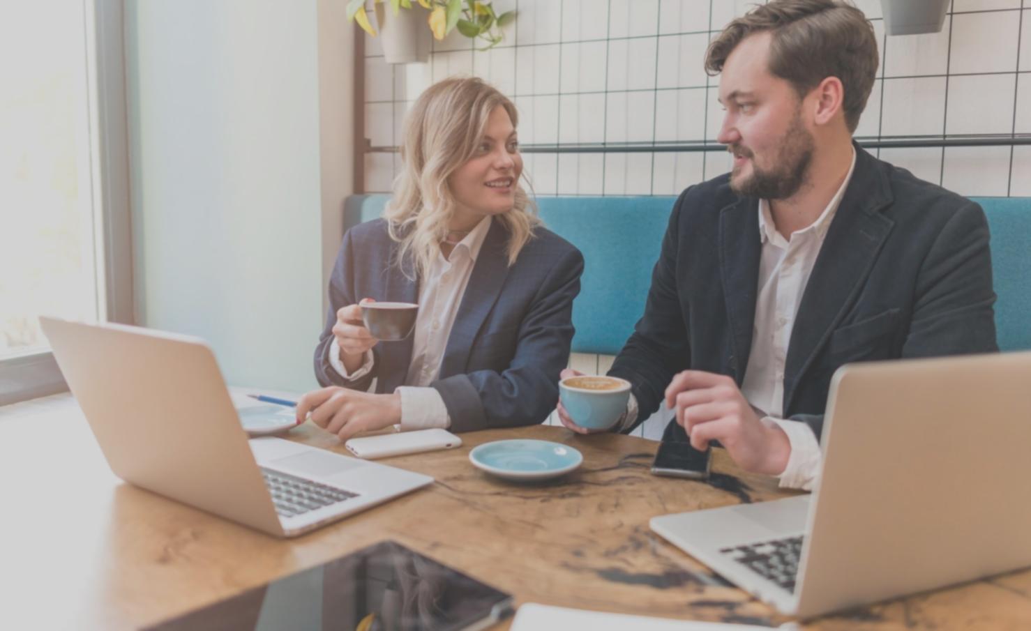 Corporate finance team conducting due diligence analysis on acquisition target using multiple data sources